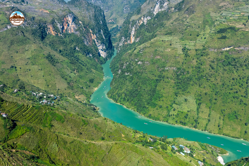 Stunning view of the Nho Que River winding through the mountains as seen from the pass above.